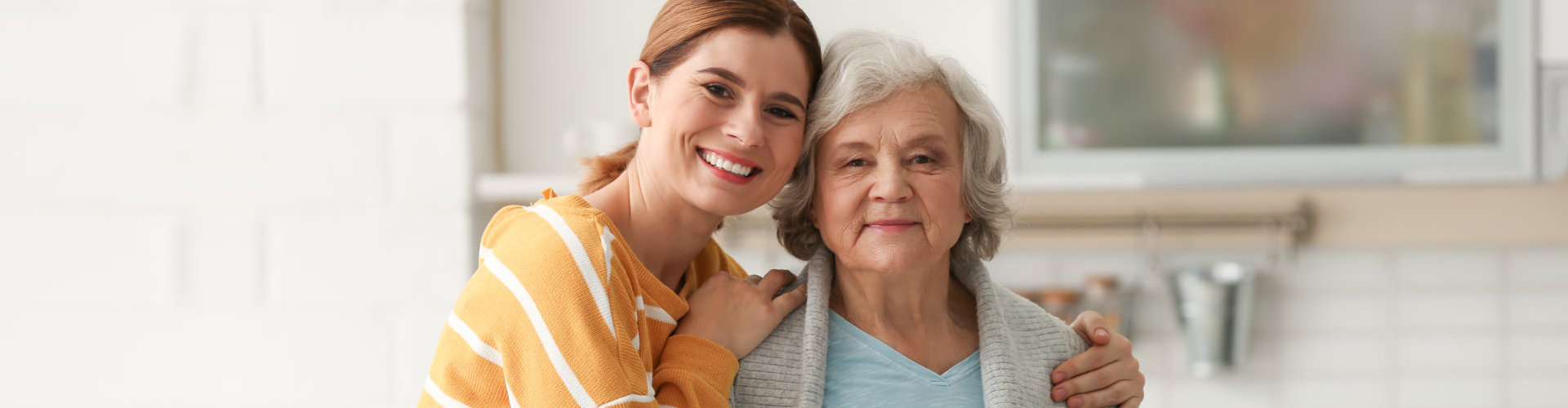 two ladies smiling